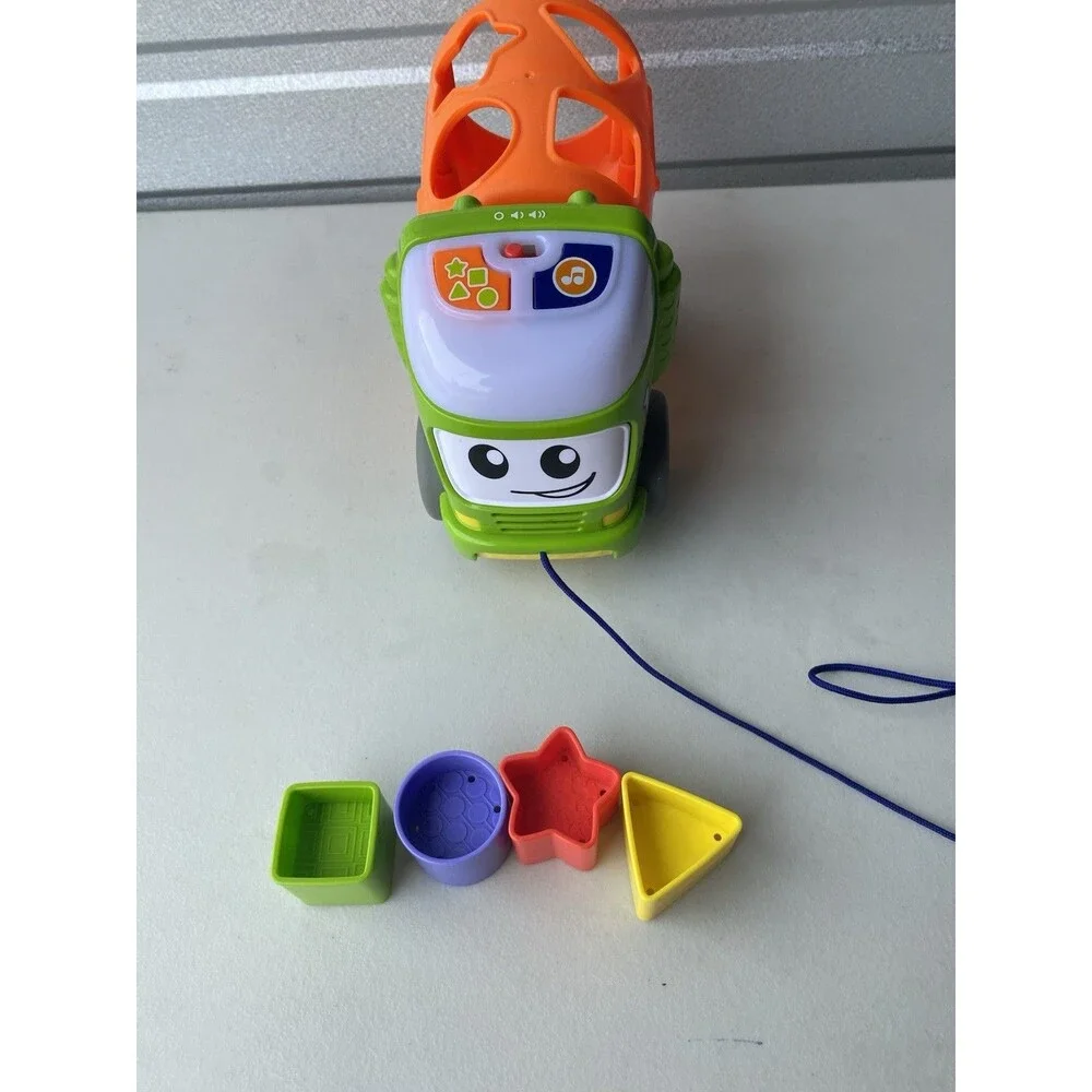 Fisher-Price Sort & Spill Learning Dump Truck Musical Shape Sorter